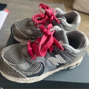 Kids Gray Size 9 New Balance 2002R with custom pink laces and beads